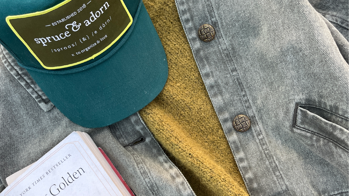 spruce & adorn™ transitions right into each next season with grace. Here we come fall, super greens is the perfect oversize trucker cap to amplify any outfit and a great book like New York Times Best Seller Theo of Golden.