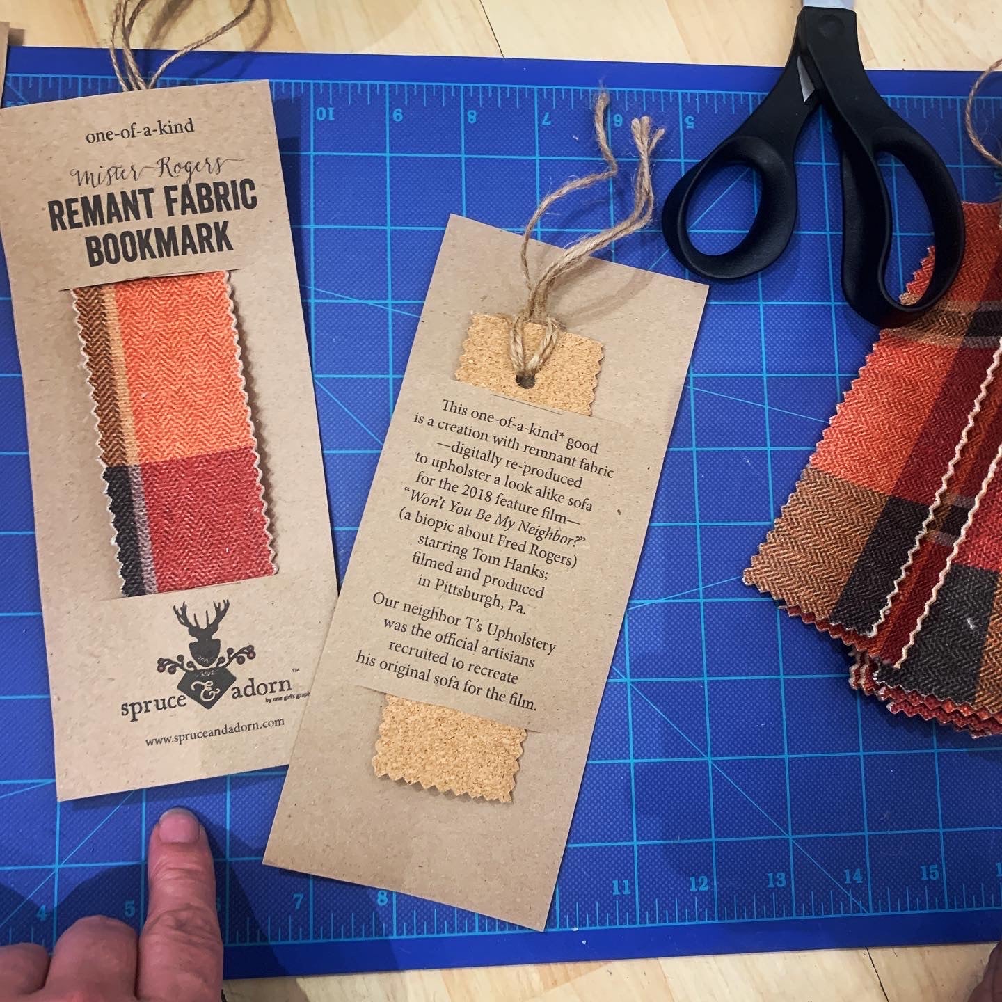 This spruce & adorn™ limited edition one-of-a-kind  Mr. Roger's  Neighborhood bookmark made of remnant fabric printed to replicate sofa has a wild story all in its own how it came to be. The way projects plant seeds in artist Jenifer Schweitzer lap to share with the public are not lost on her. spruce & adorn™  is a life styled with intention™